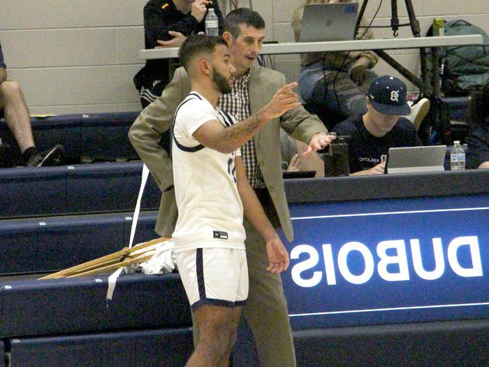 Penn State DuBois men’s basketball head coach Dan Smay discusses a defensive matchup with freshman Kaleb Pryor during a basketball game at the PAW Center this season. Smay was selected as the PSUAC men’s basketball coach of the year this season.